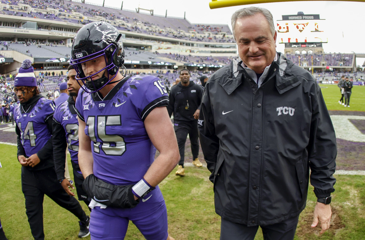 Max Duggan and Sonny Dykes walk off the field after a TCU win.